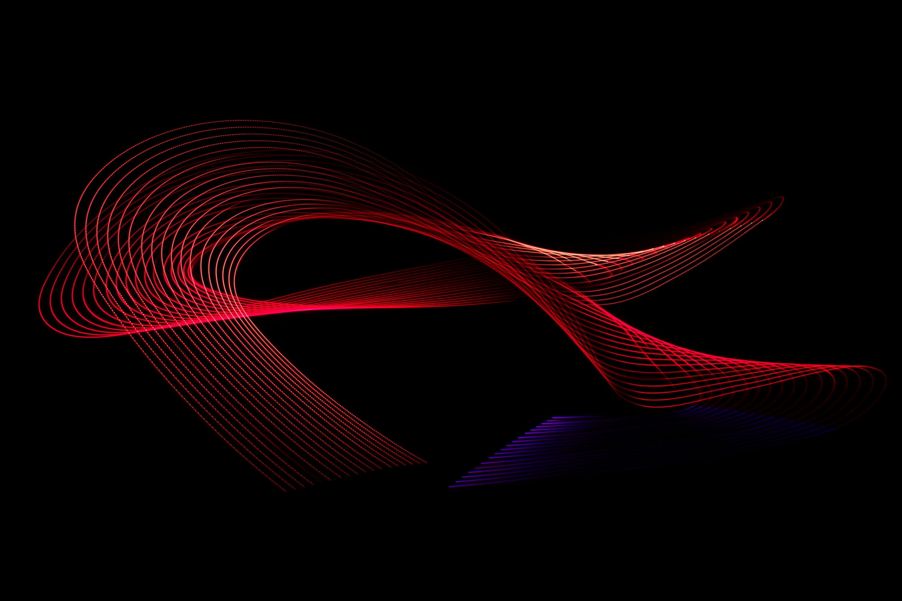 Red Knot Mainly red streams of light entangled with one violet end